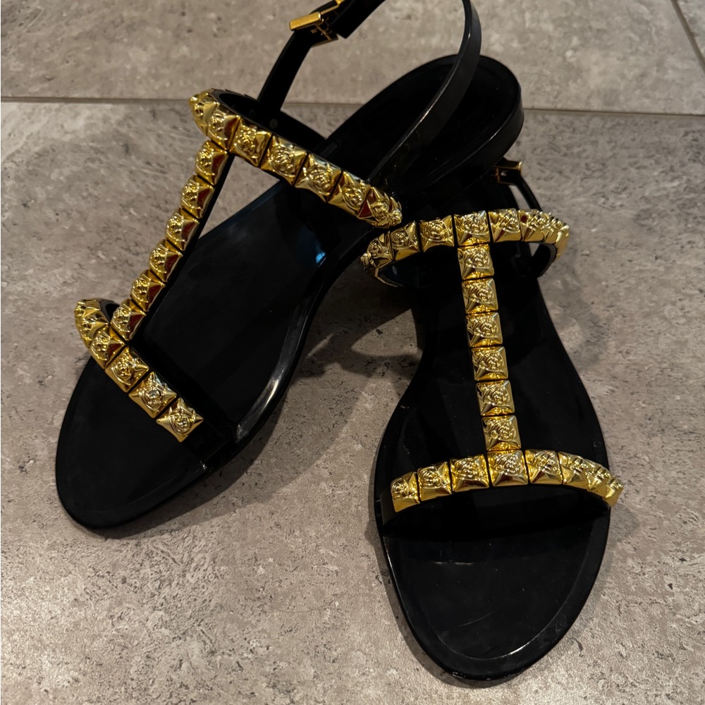 Stuart Weitzman Black and Gold T-Strap Sandals